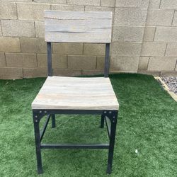 Wooden Chair With Metal Supports (Price negotiable) 