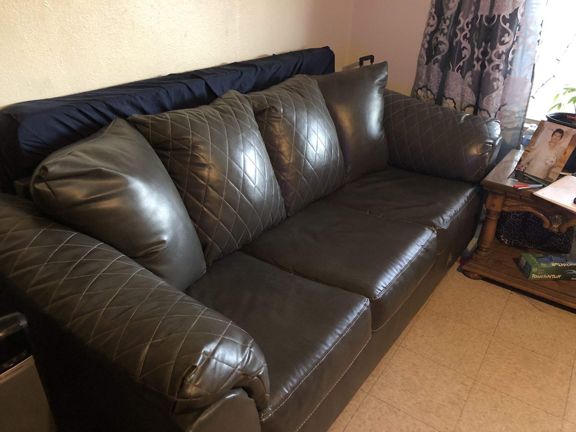 Two leather gray couches