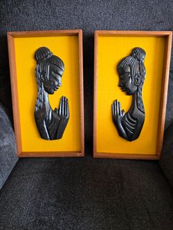Pair of Carved Wood Figural Wall Plaques
