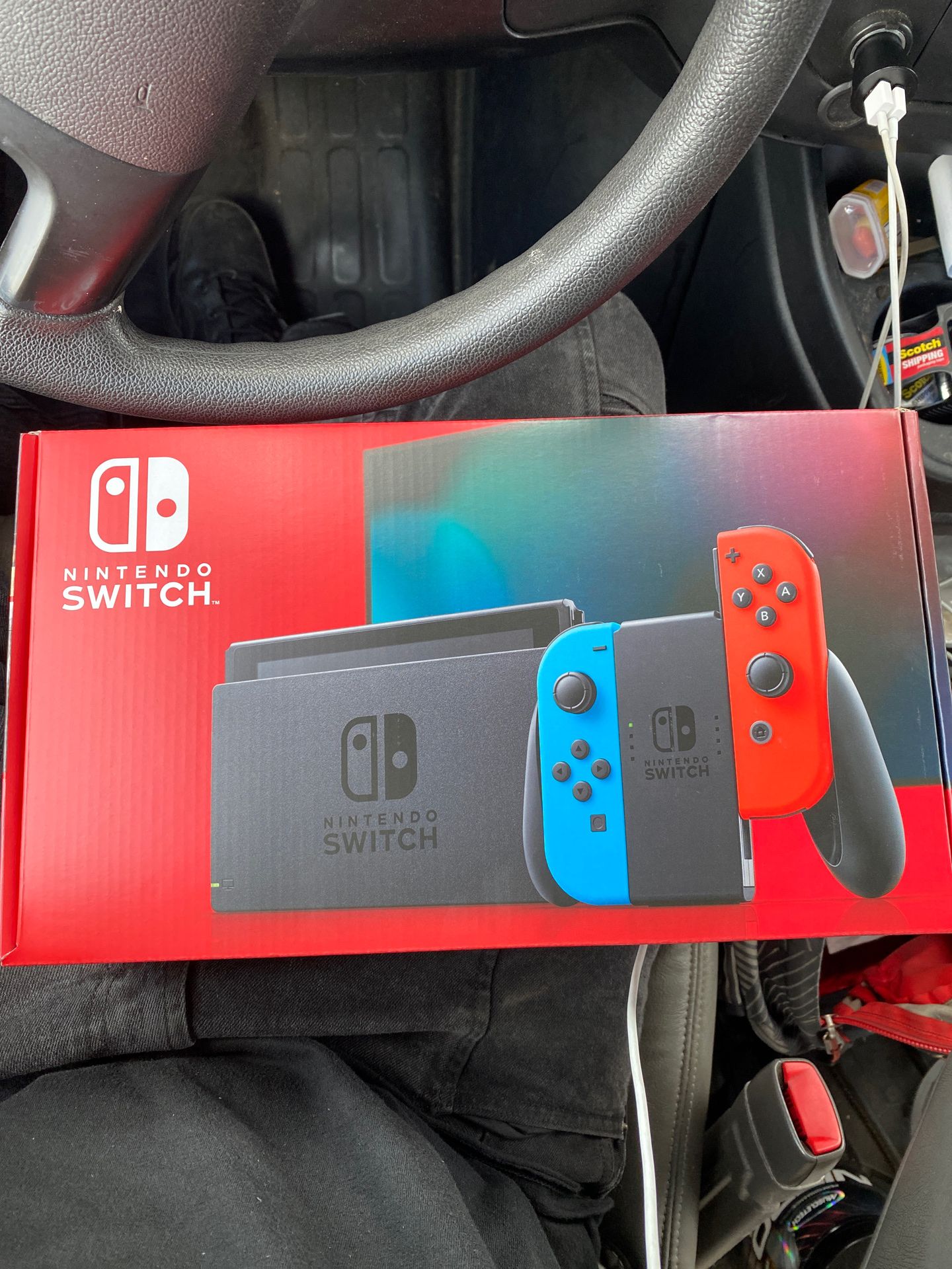 Nintendo Switch “NEWEST MODEL” red/blue joycon