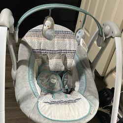 Ingenuity Compact Lightweight Portable Baby Swing with Music, Nature Sounds and Battery-Saving Technology 