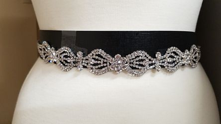 Gorgeous crystal belt with satin back to tighten it on ur waist(the black part is just to hold it)
