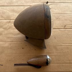 1940’s  Headlight buckets with torpedo fender turn signal lights.