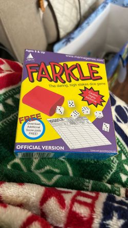 This image shows the dice game "Farkle," specifically the Official Version by Marina Games. Game Type: Farkle is a classic dice-rolling, risk-taking