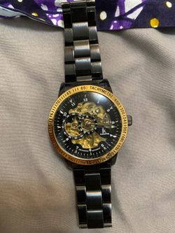 stainless steel automatic watch with a solid, heavy feel