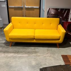 Yellow fabric sofa (3-seat, mid-century look, wood legs)