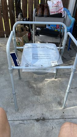 Brand new folding commode (toilet)