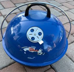 Miller charcoal grill hand held