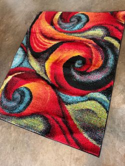 4/6ft new condition colorful area rug