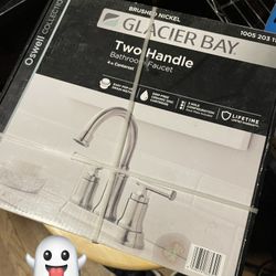 GLACIER BAY Oswell COLLECTION Double Handle High-Arc Bathroom Faucet