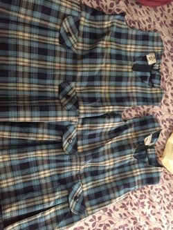 Blue plaid uniform jumpers