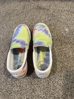 Women’s or youth girl size 7 gently used Nike slip on shoes