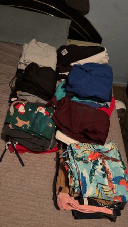 Stacks of all types of clothes