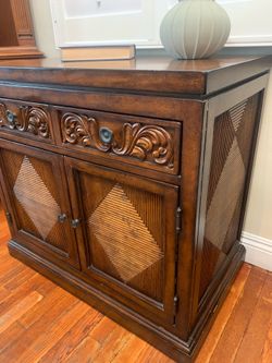 Tommy Bahama  cabinet solid wood carved