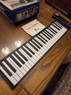 PORTABLE PIANO KEYBOARD 49 KEYS - NIB