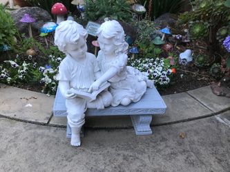 Adorable Polyresin boy & girl on bench garden statue