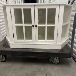 Media console with glass doors