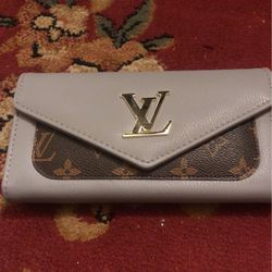 Louis Vuitton  Ladies wallet Brand new gray color