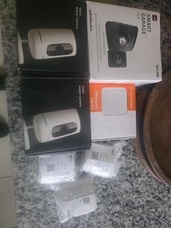 Vivint monitor, indoor cameras, wifi booster, motion sensors, garage opener, and front door opener ALL BRAND NEW.