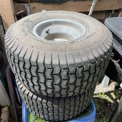 2 lawnmower, wheels good shape hold air $20 for both