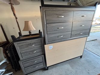 Gray dresser with attachable mirror and night stand