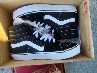 Classic Vans Sk8-Hi high-top sneakers in Black/Black/White.