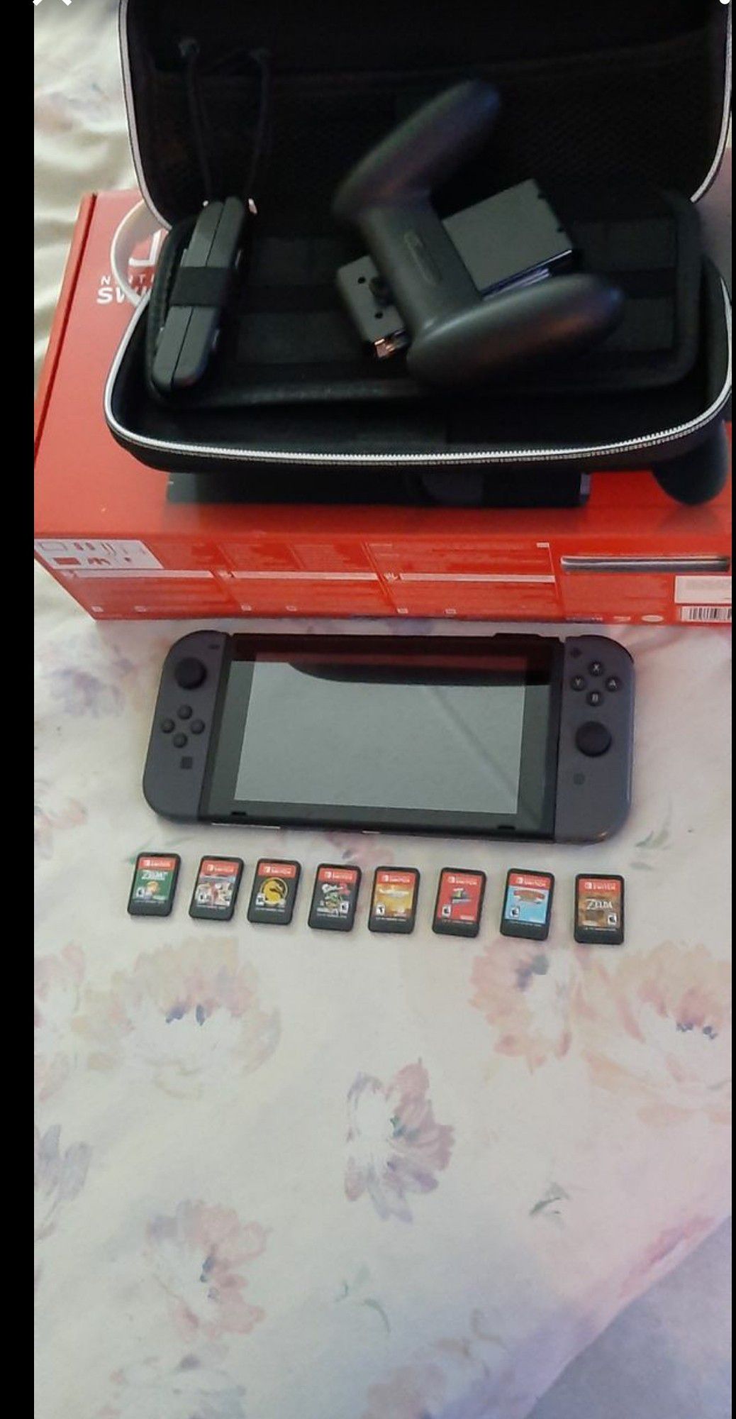 ...Mod HAC. -001(-01 )Like new with glass protector Nintendo switch adult own with 8 of the best games