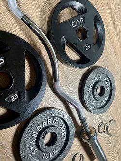 Olympic Equipment: Silver Curl Bar With Cooper Bearings & Weight Plates Pairs Of  35s, 25s And 10 Pounds   (Total: 160 lbs)