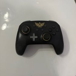 Nintendo Switch PowerA Enhanced Wireless Controller Gold Hylian Crest from The Legend of Zelda.