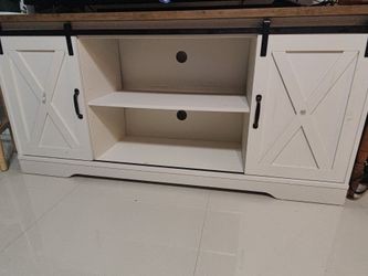 Barn door style TV stand