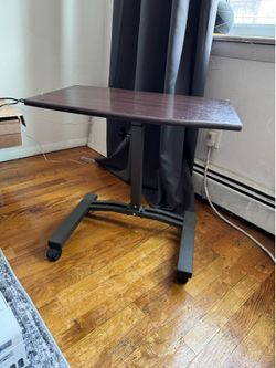 Small adjustable table