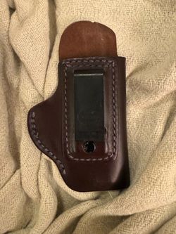 Alessi dark brown leather black talon clip styled  holster pew pew holder