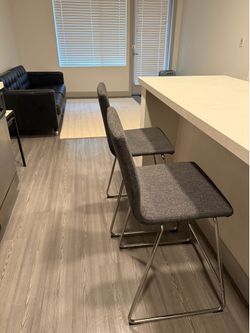 Two grey bar chairs from ikea