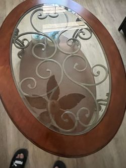 Oval Glass Top Coffee Table with Scrollwork