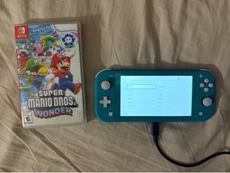 Nintendo switch lite w/ super Mario bros wonder