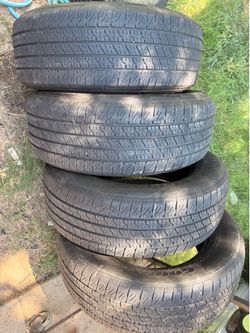 Set Of Four GOODYEAR WRANGLER TERRITORY HT 275/60R20 115H. Two Have Patches