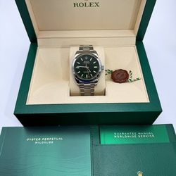 Rolex Milgauss 40mm 116400GV Green Black Dial Stainless Steel Oyster Bracelet Smooth Bezel watch box booklets tag appraisal papers