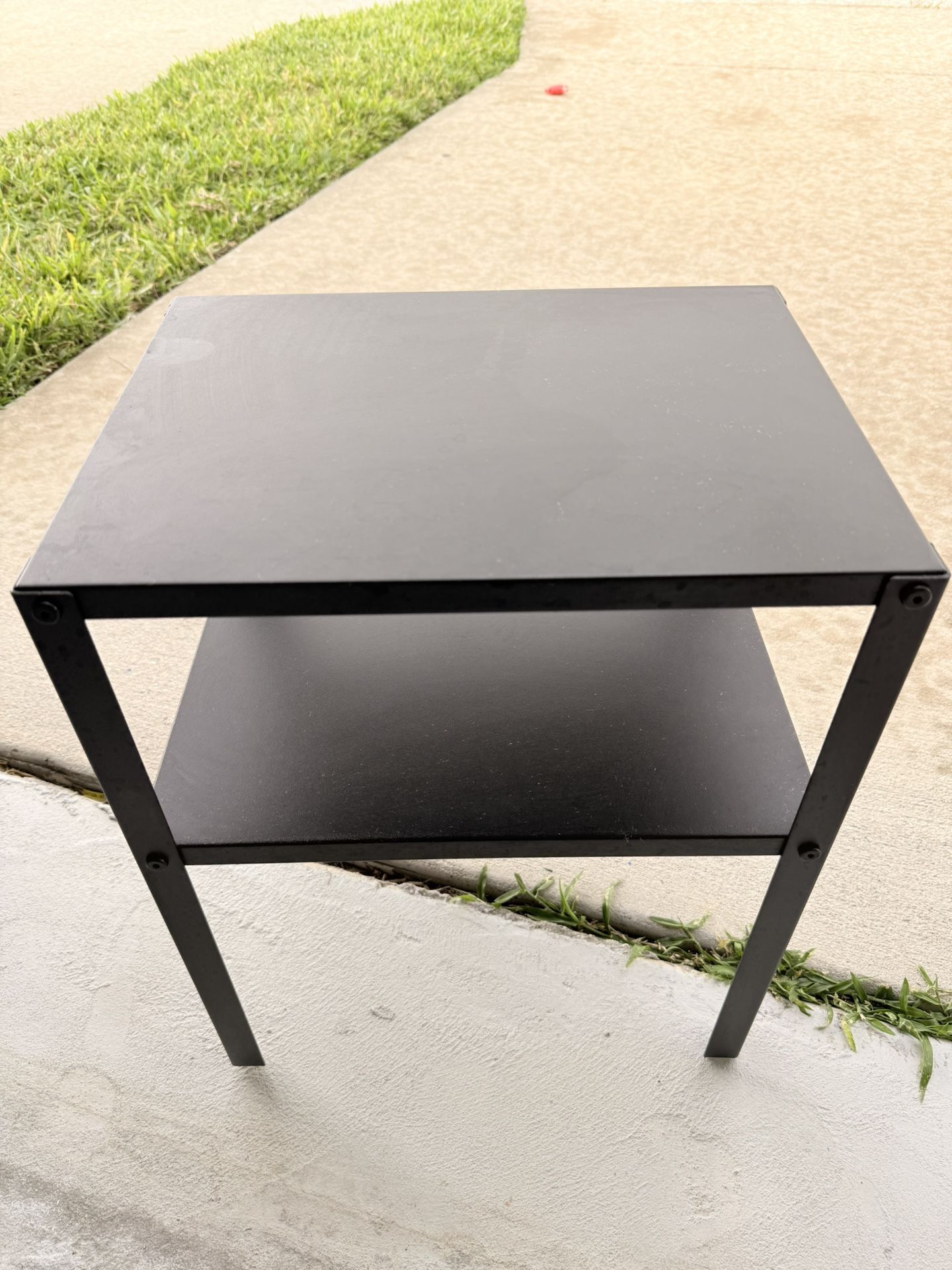 Selling a small black table, 17.5x14x10.5 in.