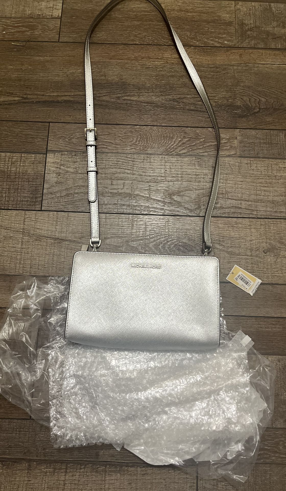 AUTHENTIC MK CLUTCH (silver) NEW!!