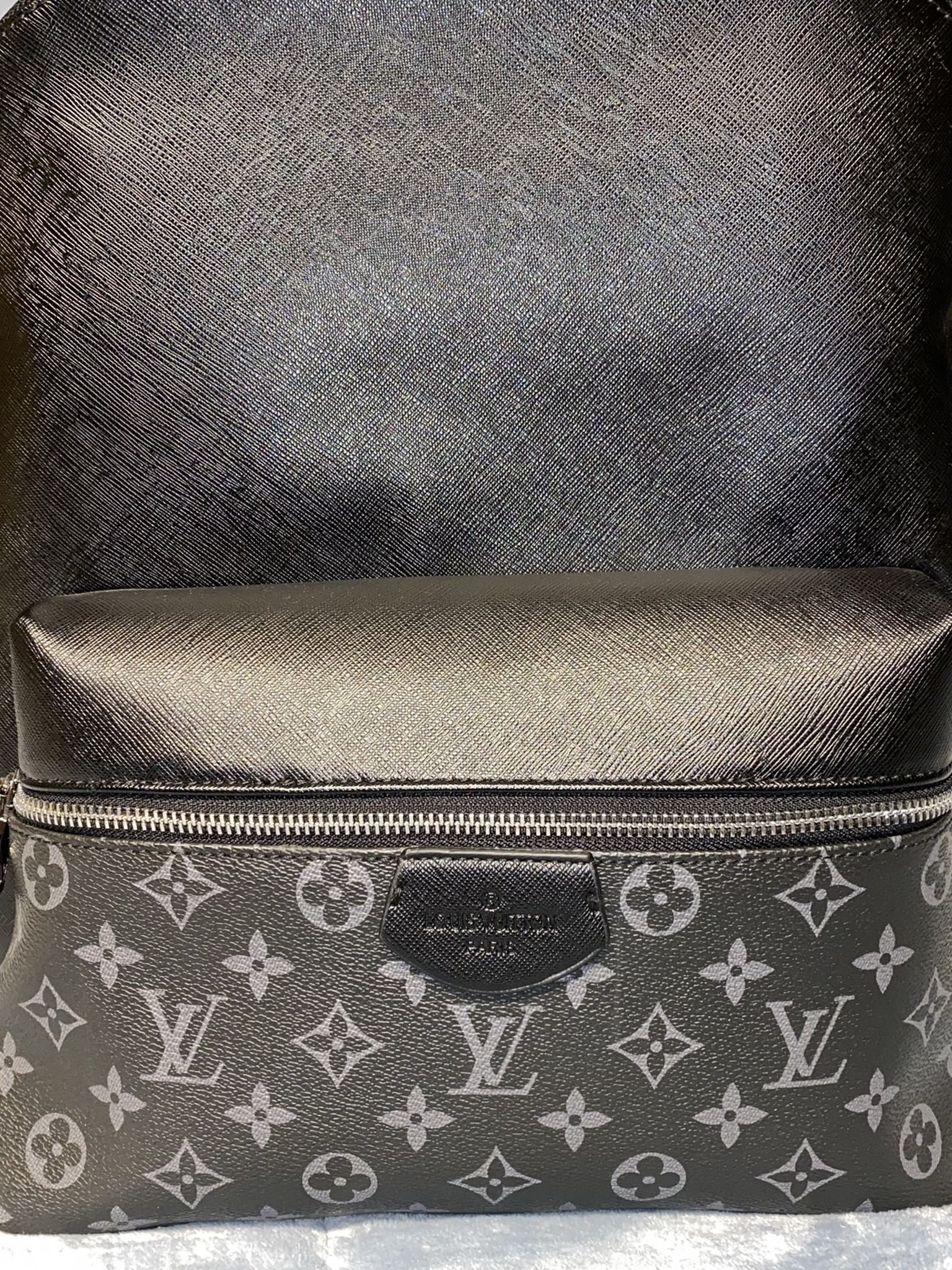 Authentic Louis Vuitton Discovery Backpack Monogram Taigarama PM