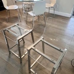 2 Acrylic counter stools.