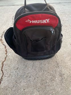 Husky backpack usada en buen estado