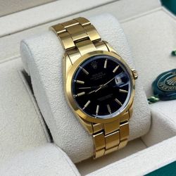 1987 Rolex OysterPerpetual Date 34mm stainless steel gold capped oyster bracelet smooth bezel black dial 15055 watch box tag appraisal