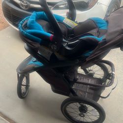 Baby stroller with car seat.