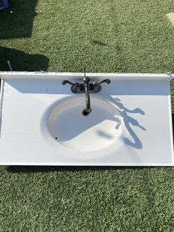 Sink with foucet and houses ready to hook