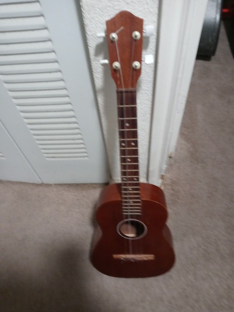 Baritone Ukule. With Case