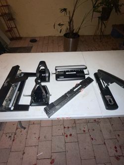 Hole punch and stapler office supplies