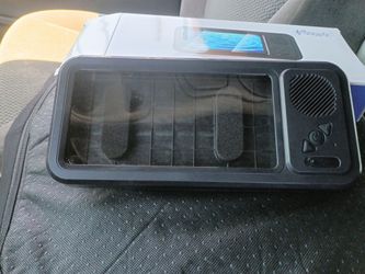 Waterproof mobile phone holder with a built-in wireless Bluetooth speaker