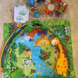 Fisher Price Baby play Mat Rainforest, music and lights Like new.