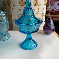 Vintage Tiara glass blue glass footed candy dish with strawberry pattern.